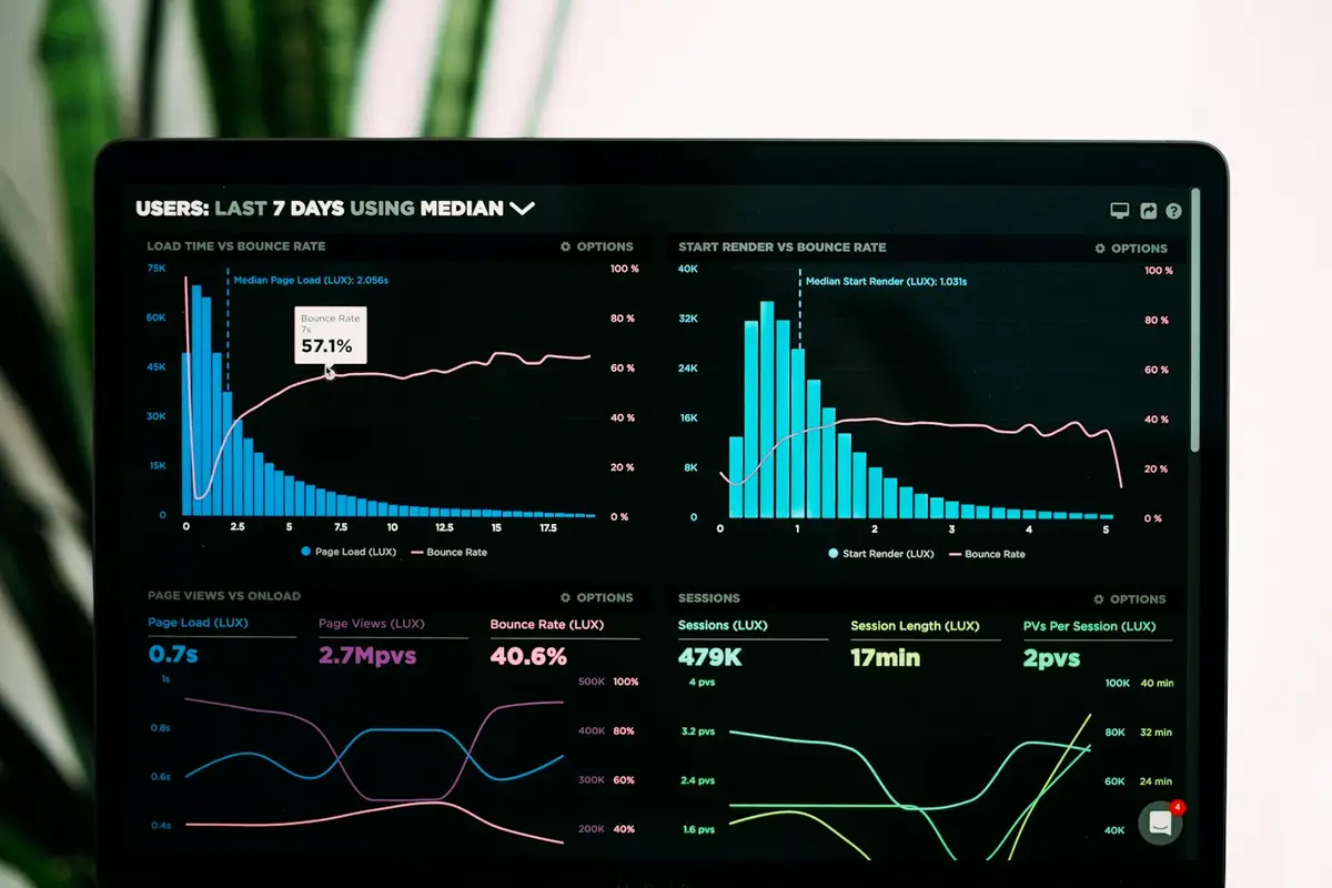 Data analysis and research documents spread across a desk for ETF grading methodology